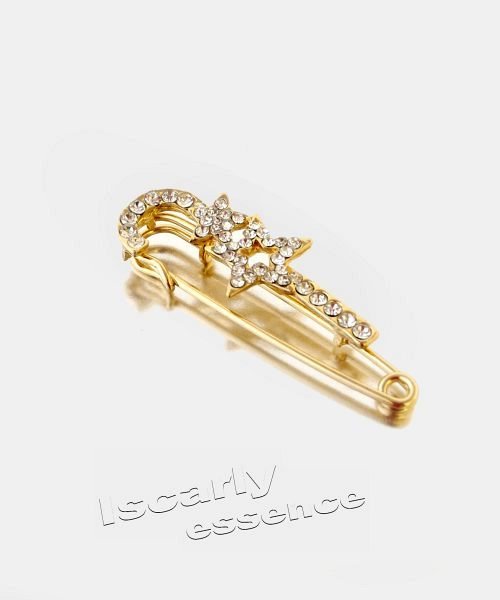 Broche detalle estrella