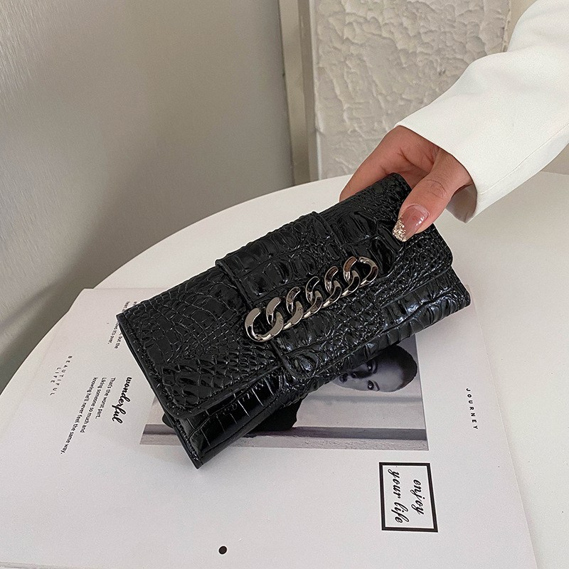 Compact croc-effect clutch with chain detail (image for) Compact croc-effect clutch with chain detail