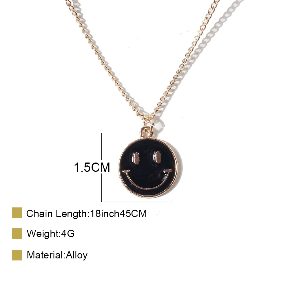 (imagen de) Collar smiley circular esmaltado en tono dorado