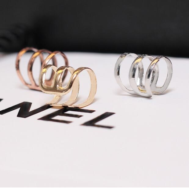 (imagen de) Pendientes de aleación ear cuff triple, acabado metalizado