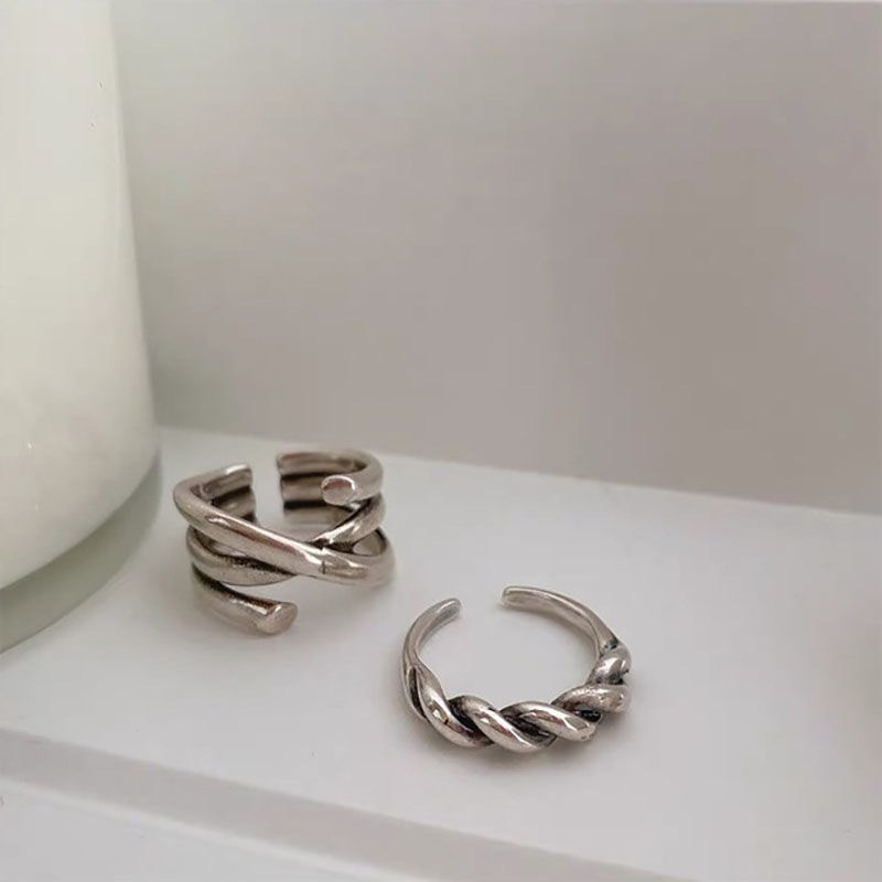Set de anillos ajustables trenzados en tono plateado (imagen de) Set de anillos ajustables trenzados en tono plateado