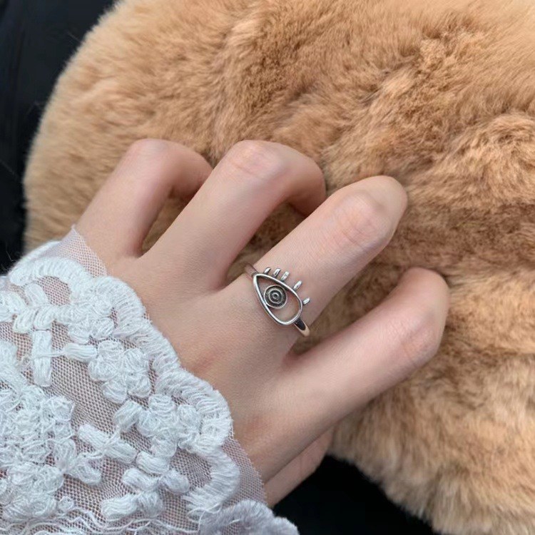Silver-tone ring with eye motif