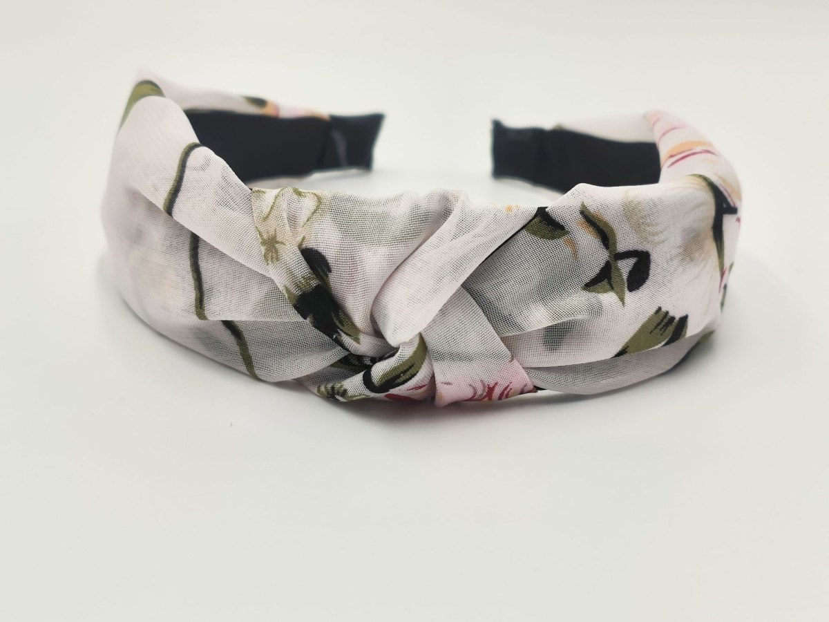(imagen de) Diadema acolchada con nudo y estampado floral de acabado pulcro