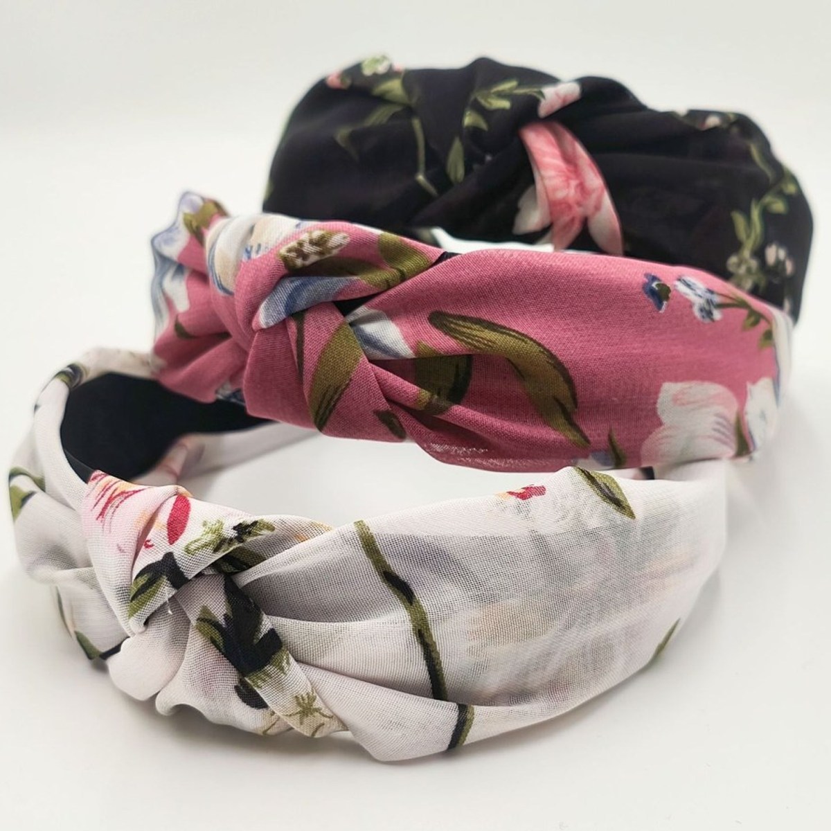 Padded knotted headband with floral print with clean finish (image for) Padded knotted headband with floral print with clean finish