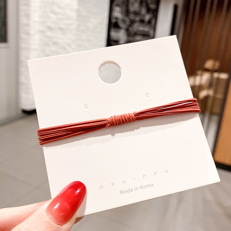 (imagen de) Pack de gomas elásticas para cabello con nudo central