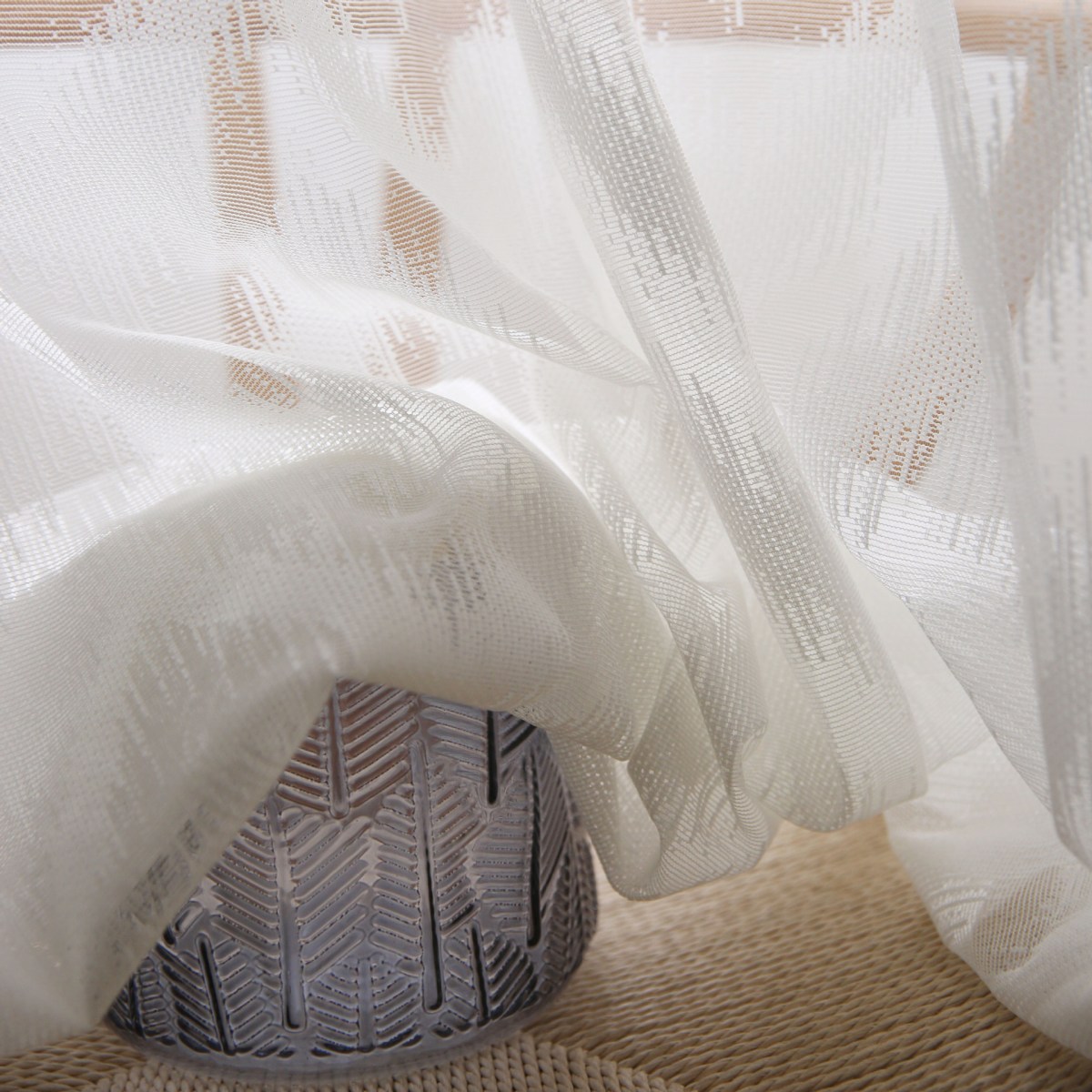 (image for) Sheer white curtain with linear pattern and pompom trim