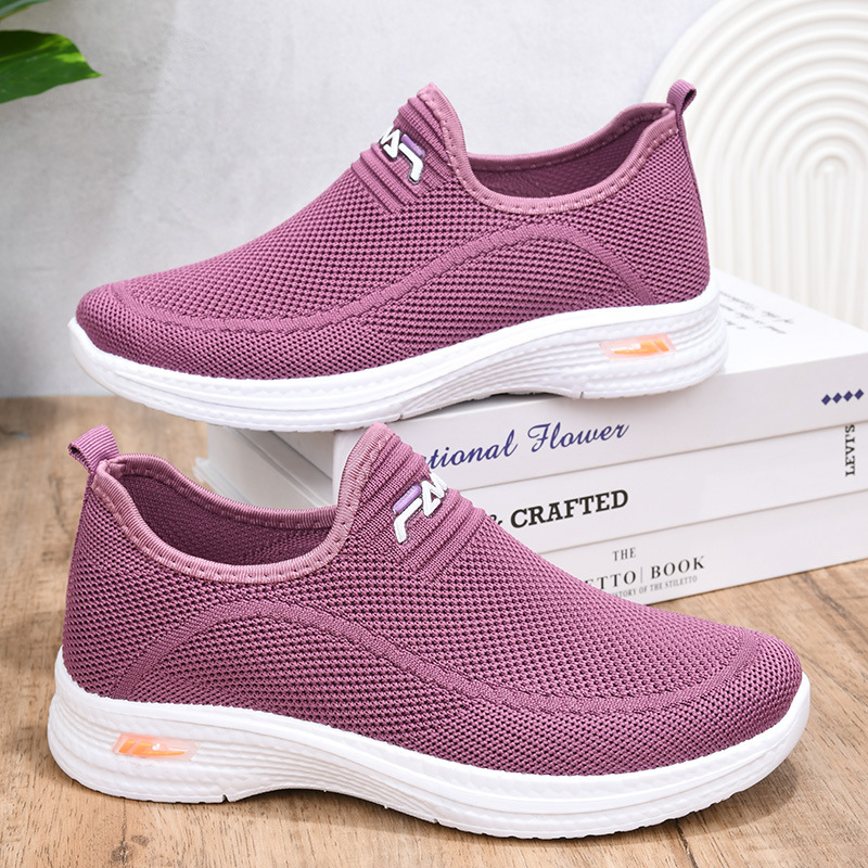 (imagen de) Zapatilla slip-on de malla trenzada con suela blanca