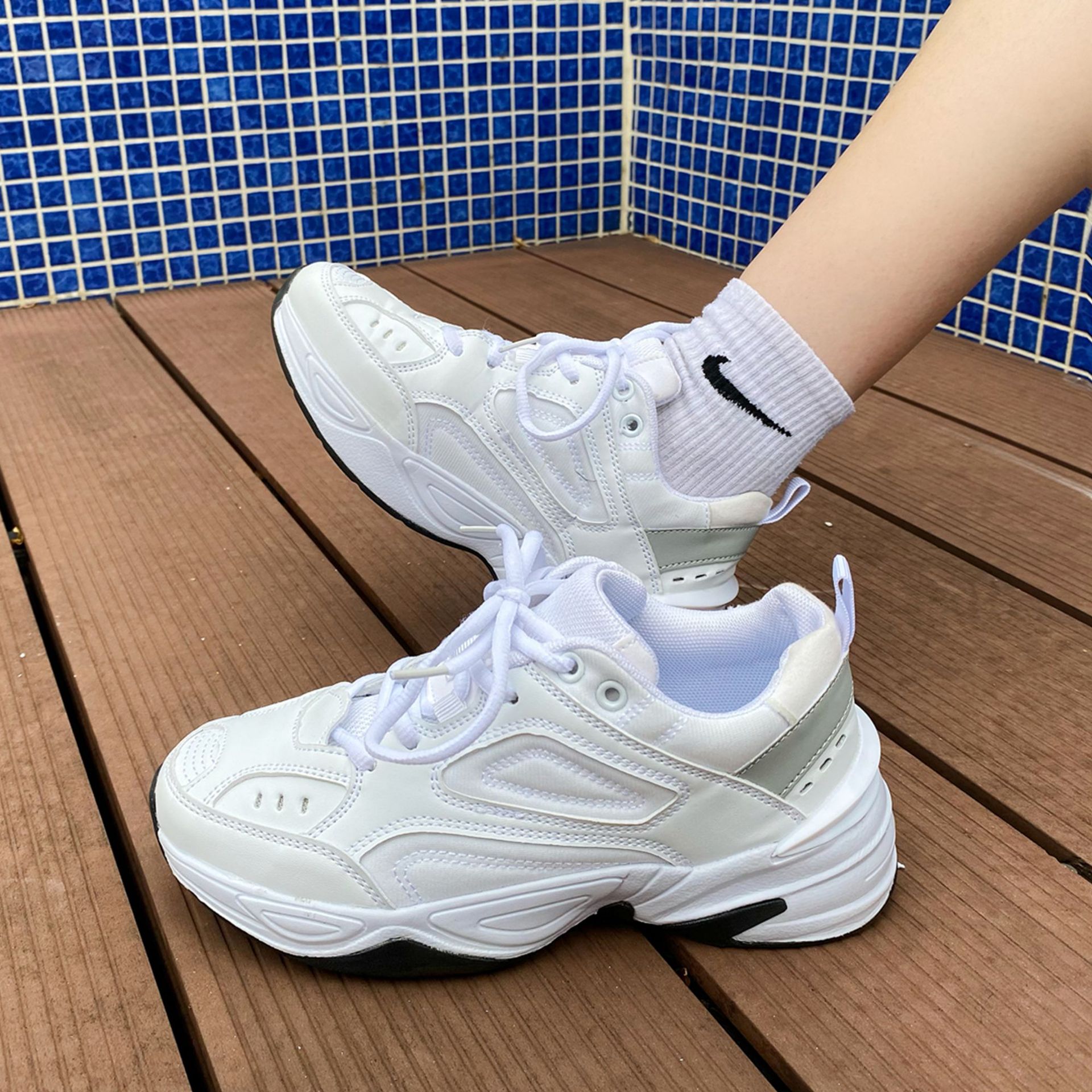Chunky athletic sneaker with thick sole and smooth panels (image for) Chunky athletic sneaker with thick sole and smooth panels