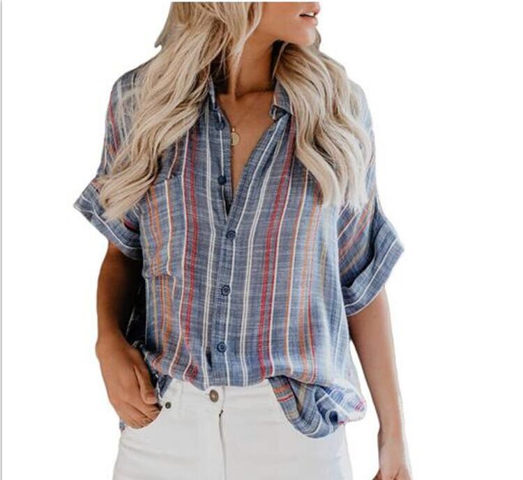 Blusa oversize de rayas con botones y m…