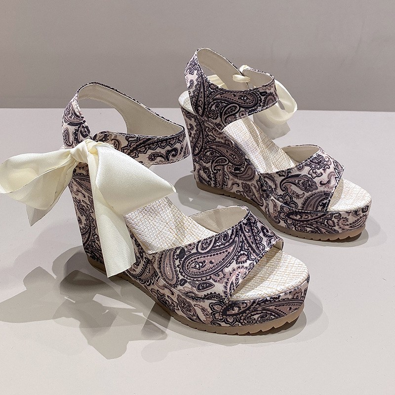 (image for) Closed-toe espadrille wedge with oversized bow and summer lift