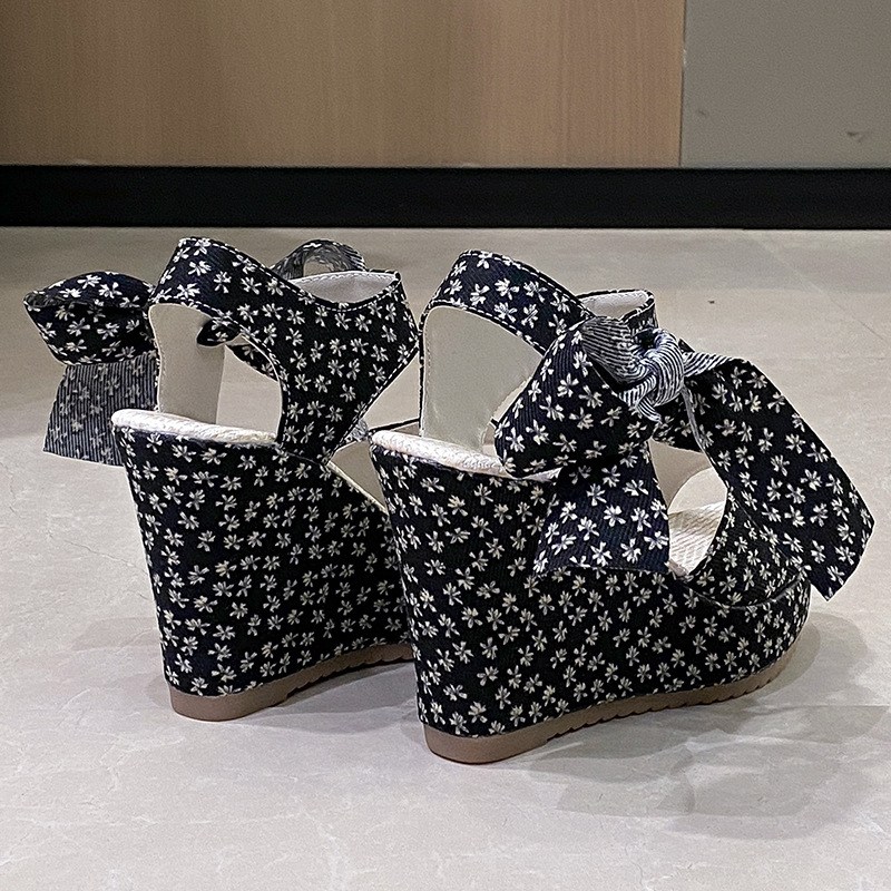 (image for) Closed-toe espadrille wedge with oversized bow and summer lift
