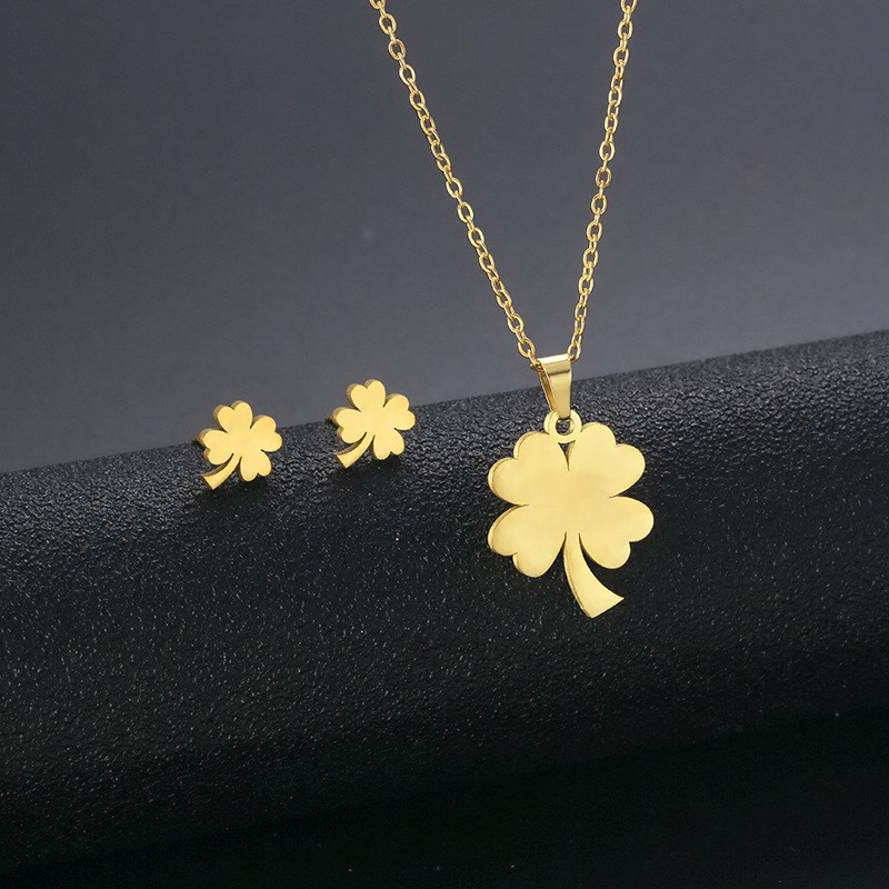 (imagen de) Conjunto de collar y pendientes trébol dorado