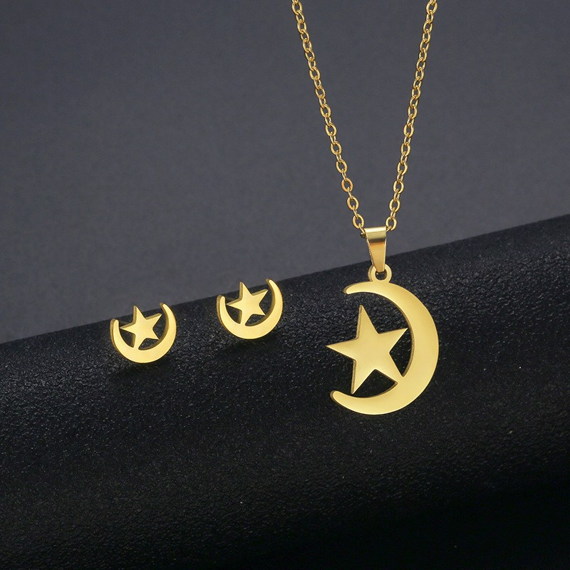 (imagen de) Conjunto de collar y pendientes luna y estrella dorado