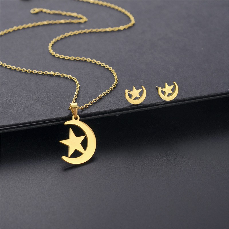 (imagen de) Conjunto de collar y pendientes luna y estrella dorado