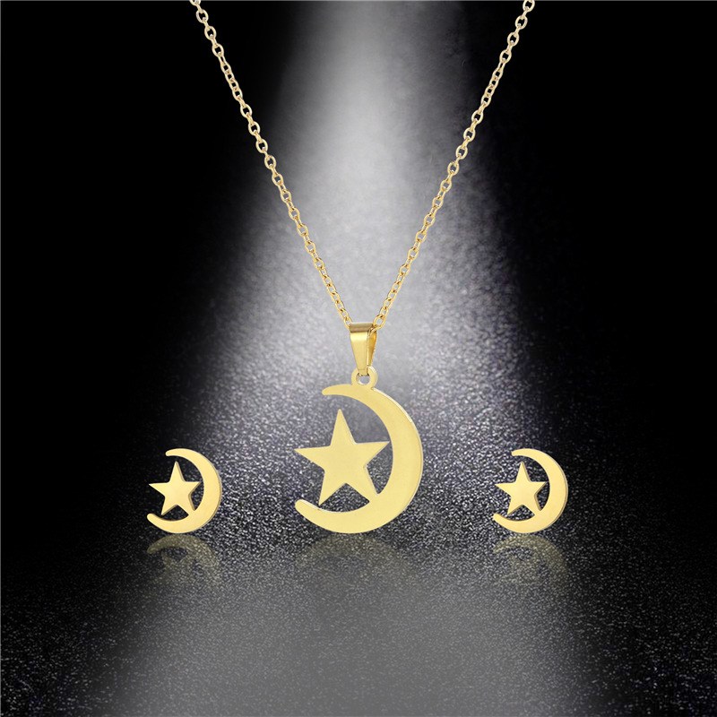 (imagen de) Conjunto de collar y pendientes luna y estrella dorado