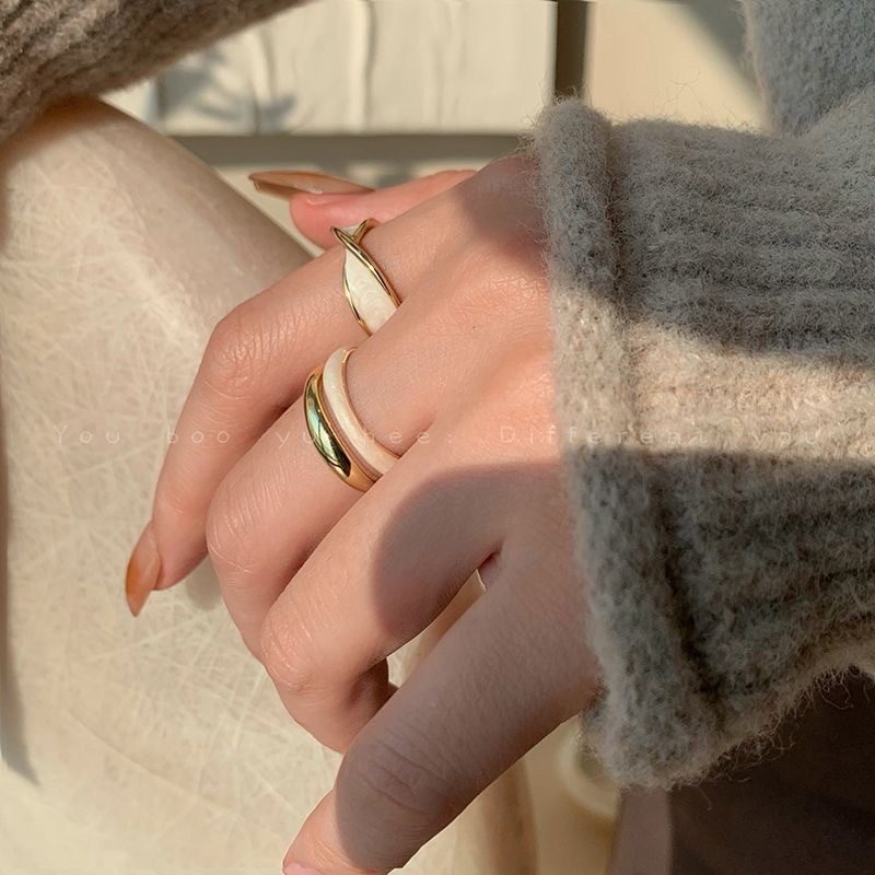 Gold-tone adjustable ring with glossy inset (image for) Gold-tone adjustable ring with glossy inset