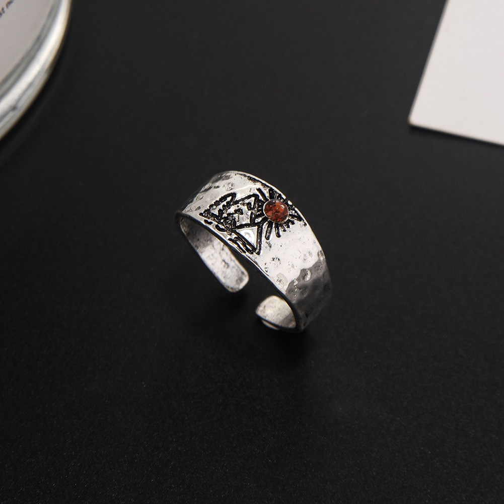 (imagen de) Anillo ajustable con sol y cristal en tono plateado