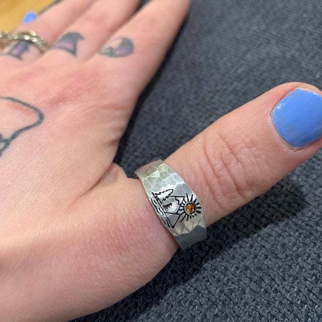 Adjustable sun-motif ring with stone, s…