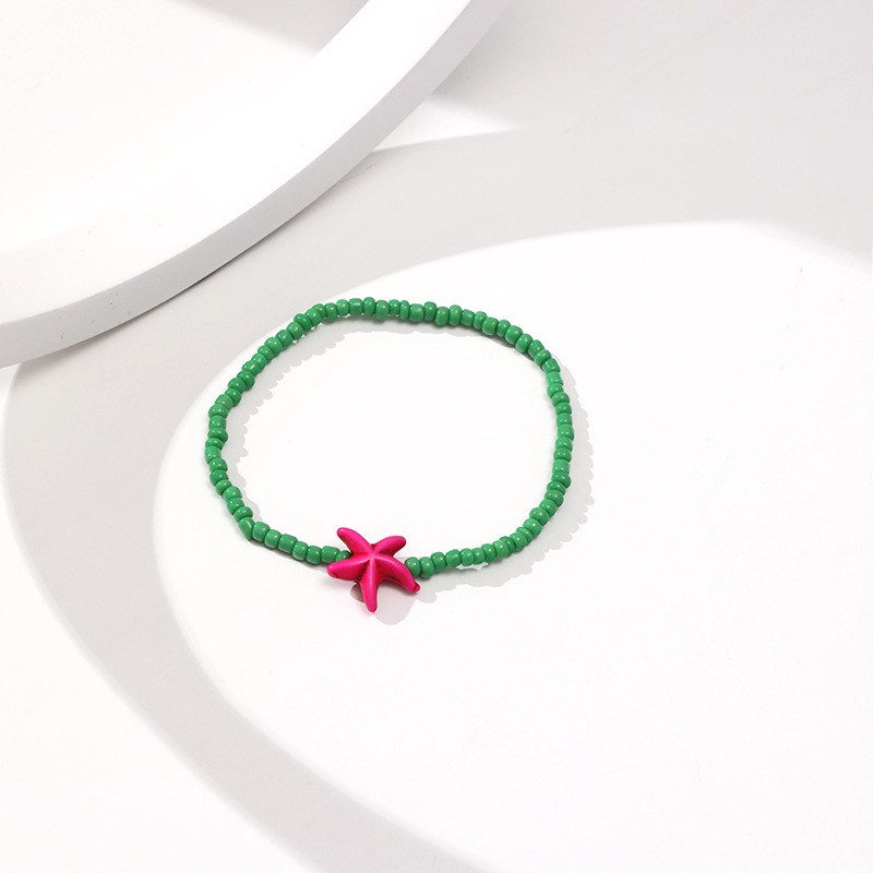 Beaded elastic bracelet with starfish charm (image for) Beaded elastic bracelet with starfish charm