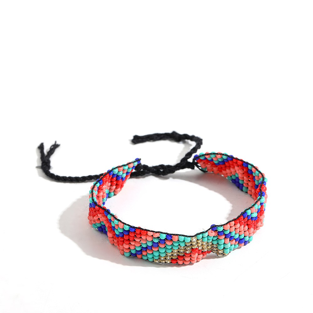 (imagen de) Pulsera de perlitas multicolor con cordón trenzado