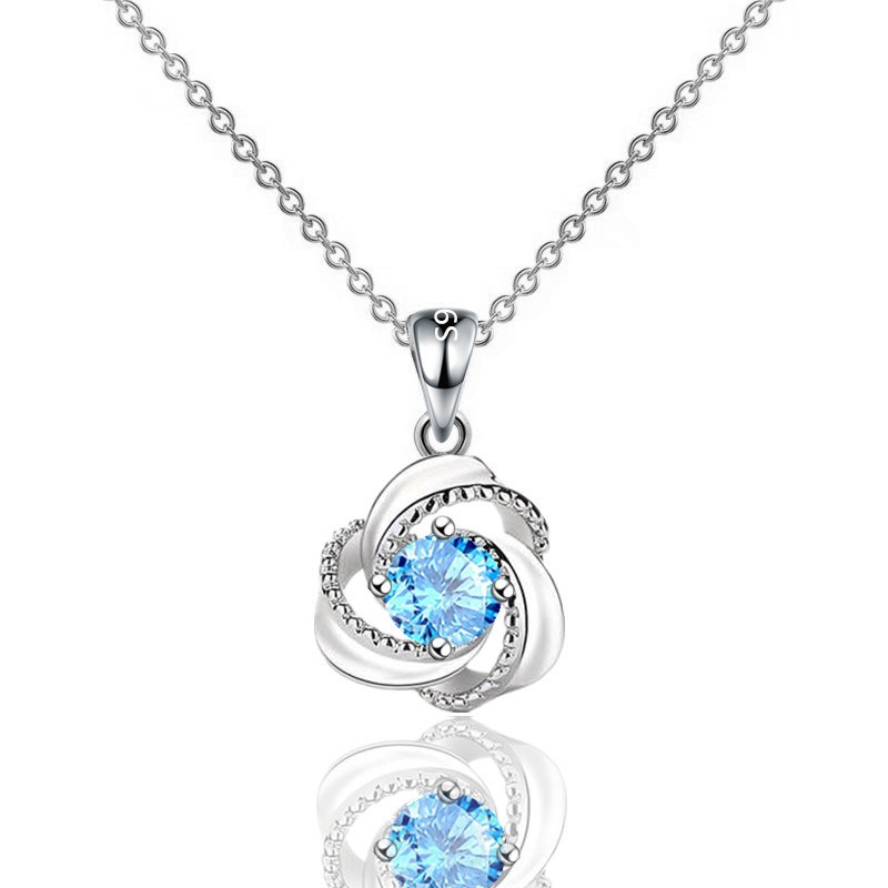 (image for) Spiral Floral Pendant with Faceted Center Stone