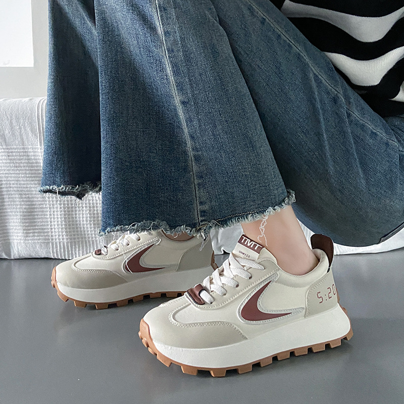Platform sneaker with lug track sole