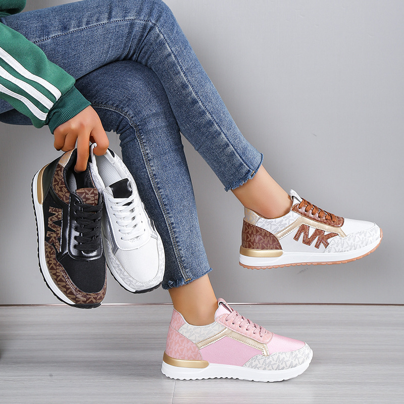 (imagen de) Zapatilla deportiva baja con monograma y acabado mix de texturas