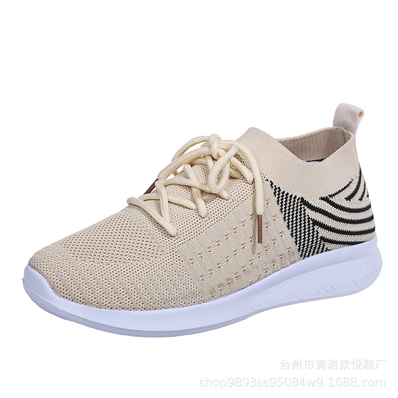 (imagen de) Zapatilla deportiva tipo calcetín con cordones y suela blanca