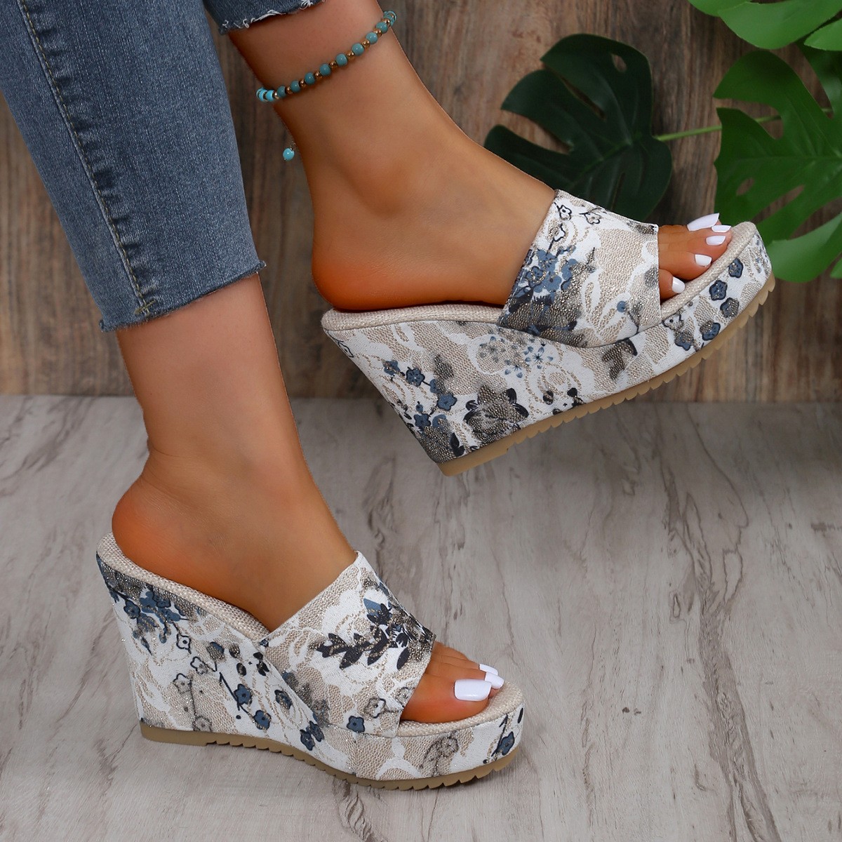 (image for) Wedge clog mule with covered upper and seasonal graphic look