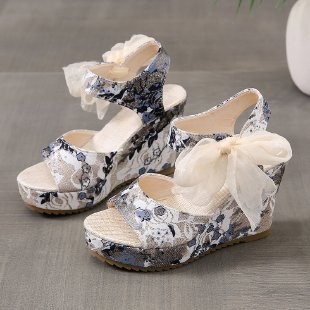 (image for) Floral textile wedge sandal with side bow and platform