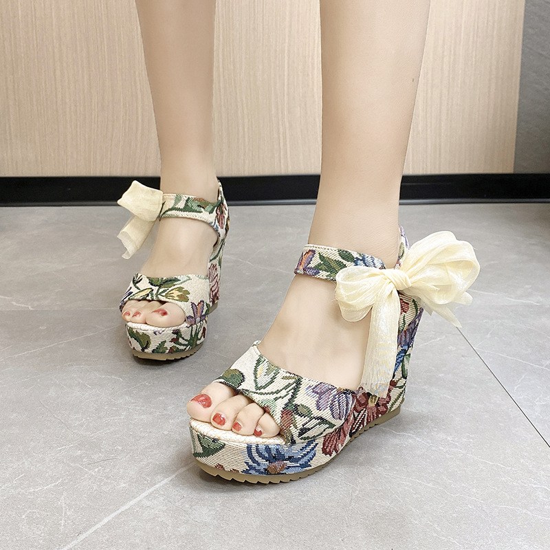 (image for) Floral textile wedge sandal with side bow and platform