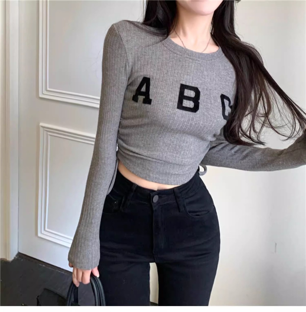 BLUSA DE MANGA LARGA entallada canalé c…