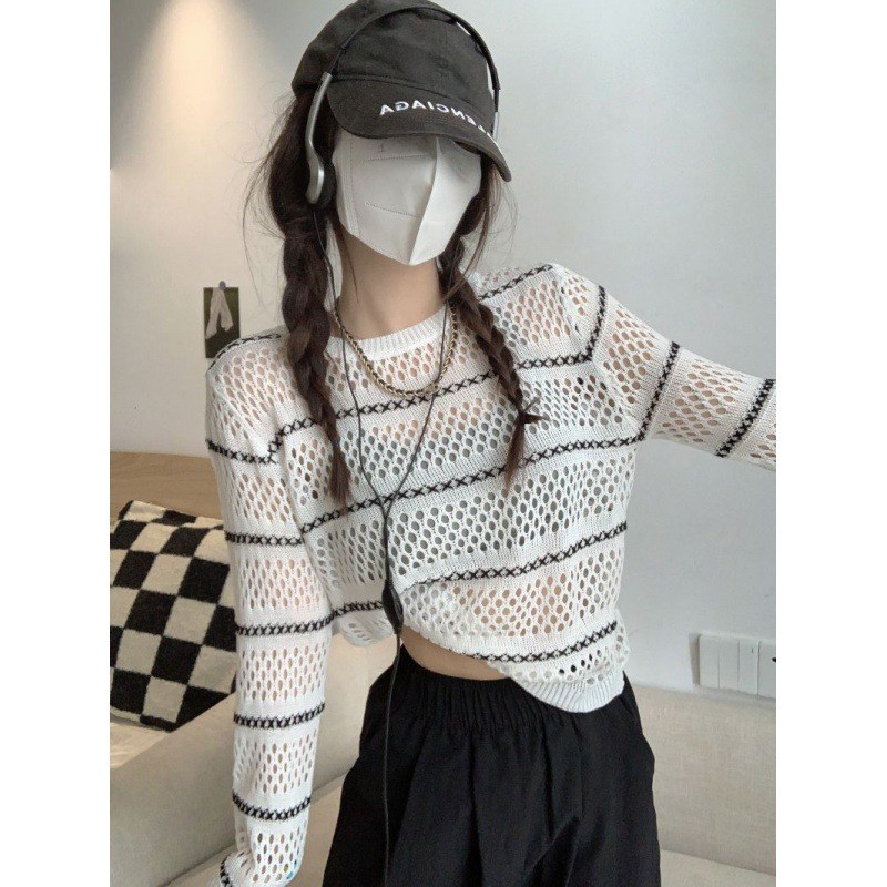 Jersey cropped calado de punto abierto…