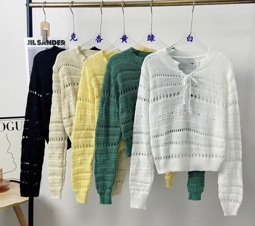 Openwork knit sweater with lace-up neckline (image for) Openwork knit sweater with lace-up neckline